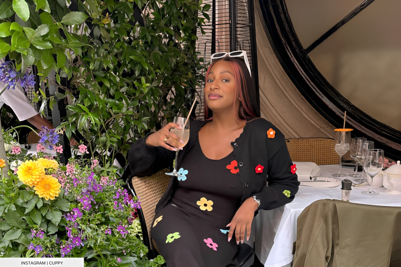 Cuppy Resembles A Black Barbie In a Floral Patched Dress