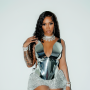 Tiwa Savage Goes All Out In a Silver Metallic Outfit