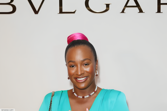Cuppy in all black dress