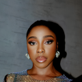 Nissi Ogulu Shines In A Rhinestone Mesh Dress