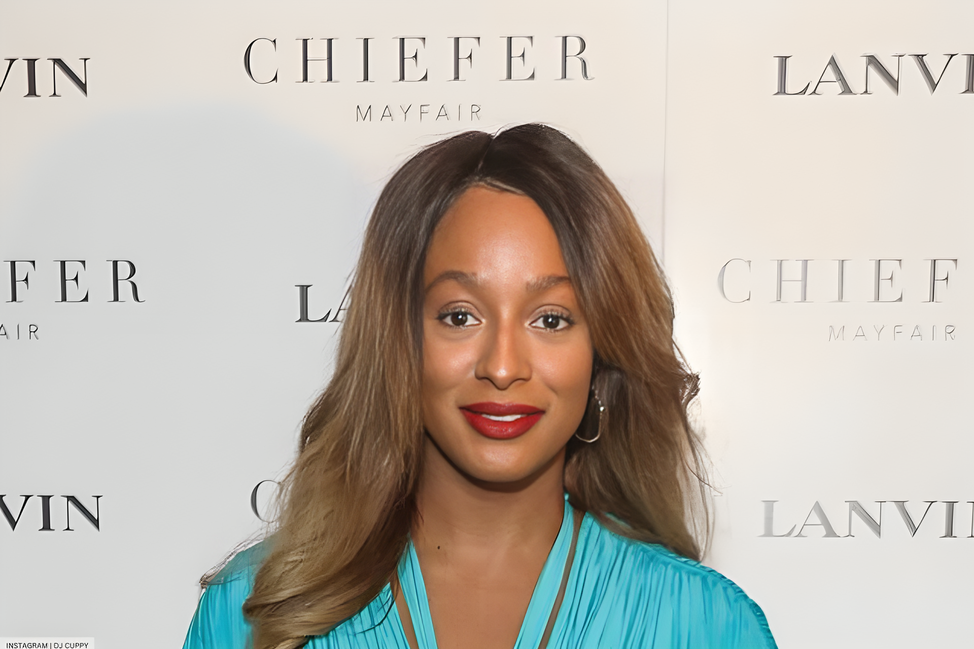Cuppy’s Turquoise Dress Is a Typical Parisian Style