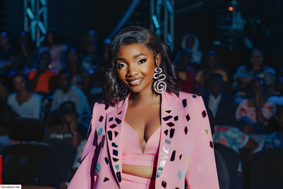 Simi Just Paired Her Blue Jumpsuit With Traditional Braids
